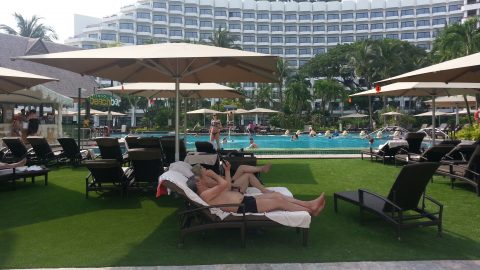 Poolside artificial grass lawn at Shangri-La Rasa Sentosa