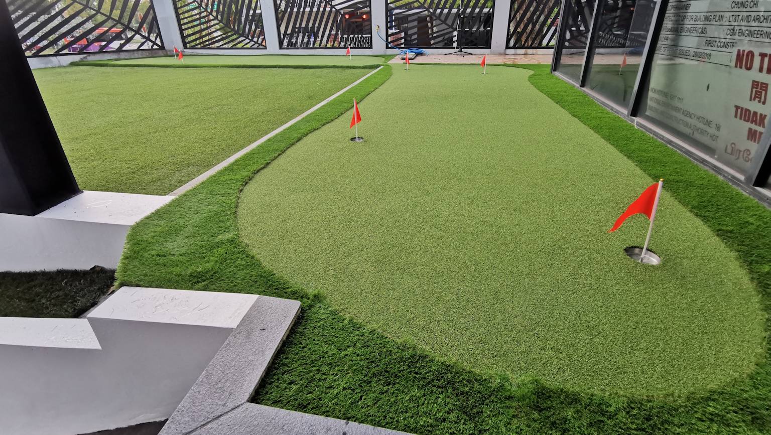 Custom artificial putting green with true contours at Serangoon Garden Way, Singapore