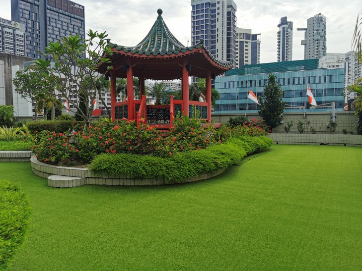 Premium Namgrass artificial grass rooftop garden in Singapore, lush and flawless