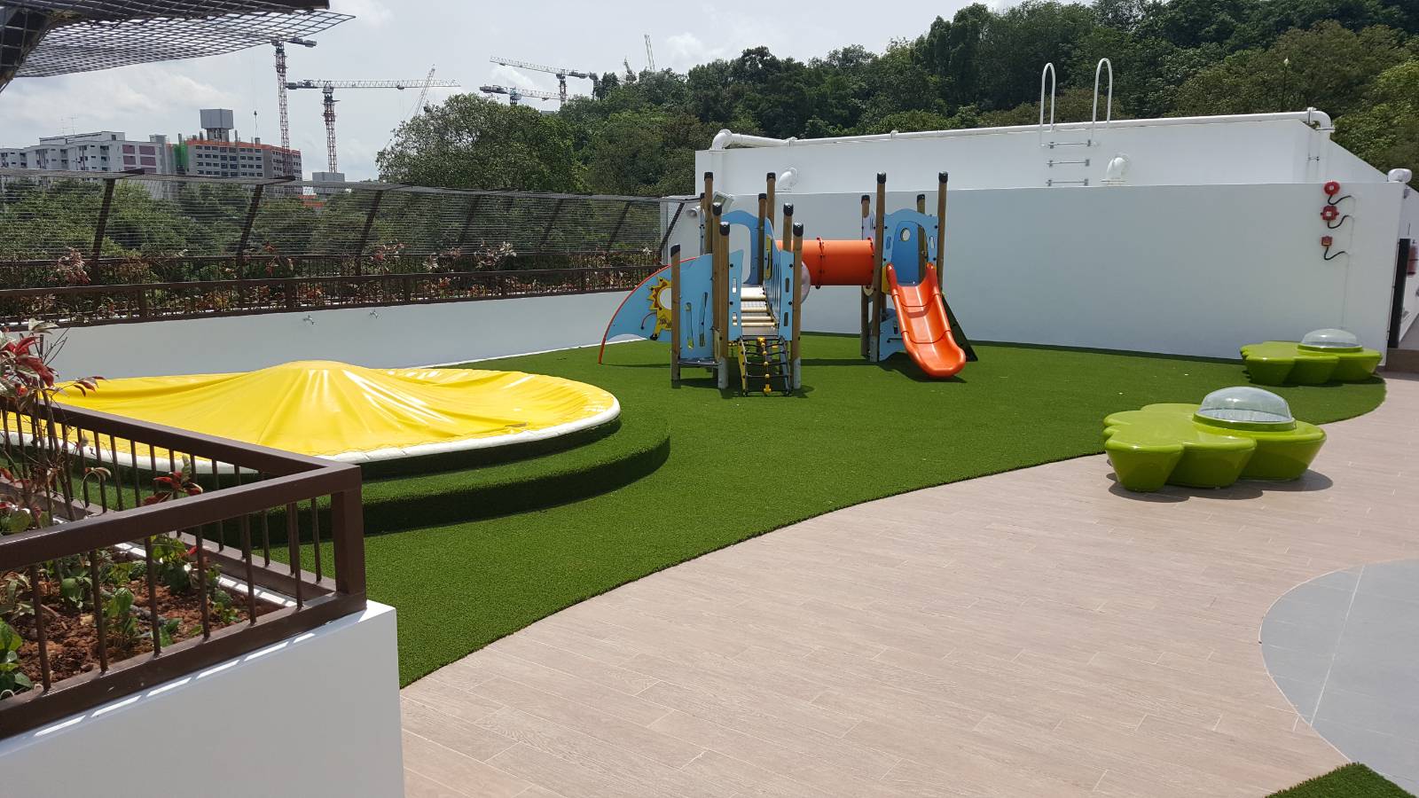 Premium Namgrass artificial grass rooftop playground at PCF Sparkletots Woodlands, Singapore
