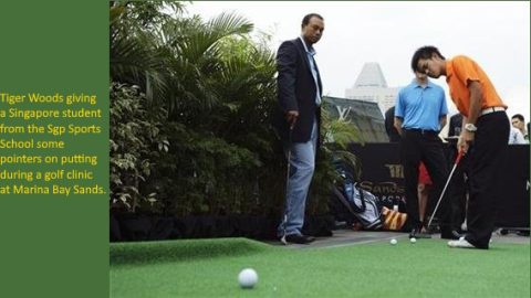 Tiger Woods at a golf clinic on an artificial putting green, Marina Bay Sands